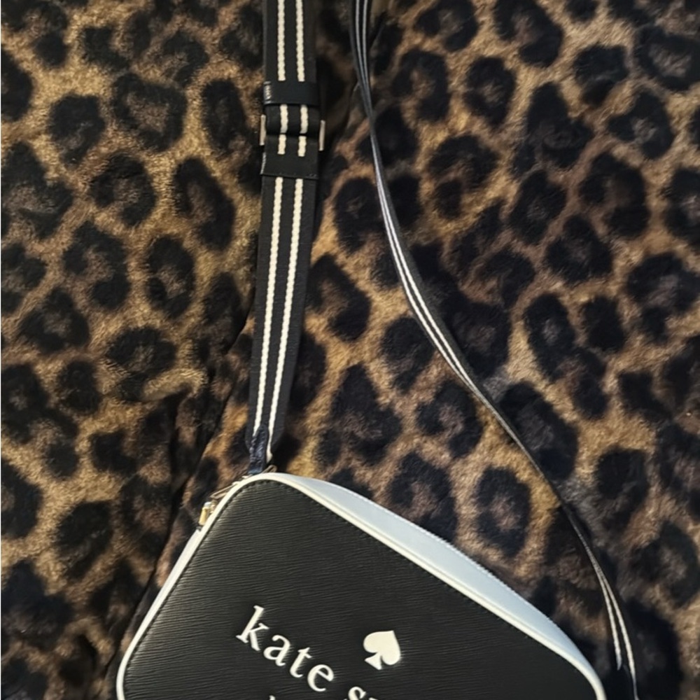 kate spade black and white crossbody camera bag with striped strap